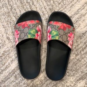 Gucci slides.